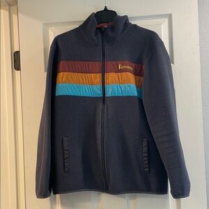 Cotopaxi Navy Fleece Jacket with Multicolor Stripes